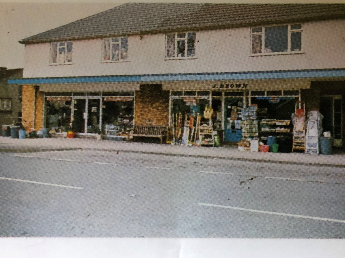 The extended J. Brown shopfront in the 1970s, with goods displayed outside